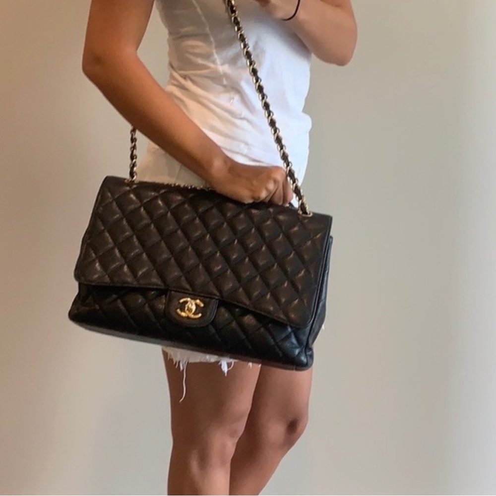Chanel black jumbo classic double flap bag with gold
